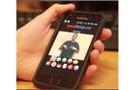 smartphone showing video of person signing 