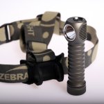 Headlamp and headband with removable top strap and black silicone holder.