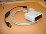 Small, rectangular device with led screen and accompanying. 