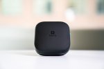 Black square, cubed-like device with Tecla logo displayed in center.