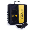 A square device with a handle and strap, control buttons on the side and the product name in a yellow swatch across the front.